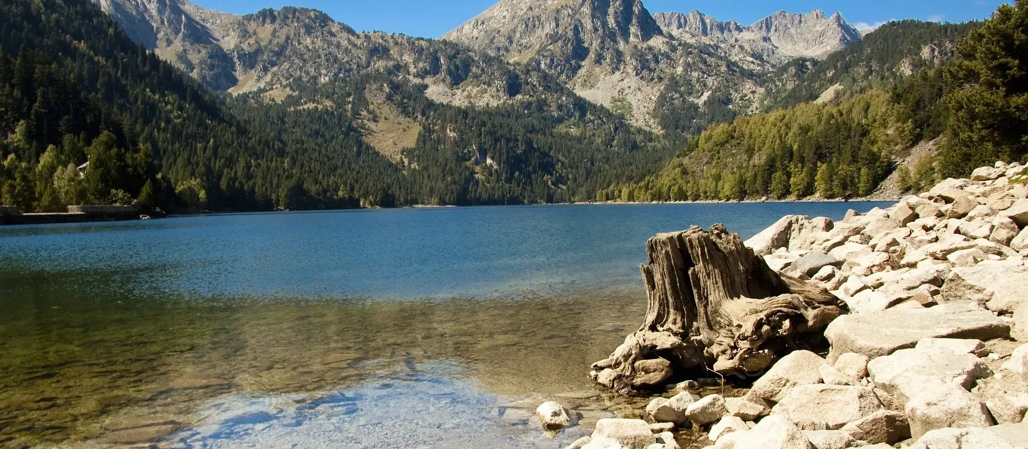 A view of a large mountain lake in the Catalan Pyrenees